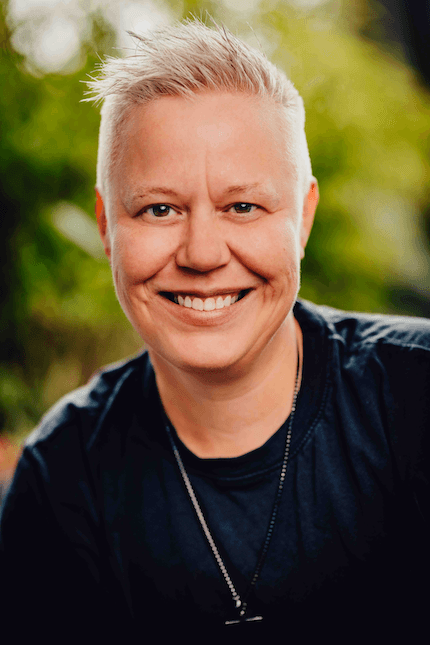 Riley Coleman, founder of AI Flywheel. Designer and educator. They/them.